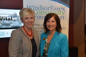 Michelle Suchiu Executive Director Workforce WindsorEssex in photo with rep from Windsor Essex Community Foundation