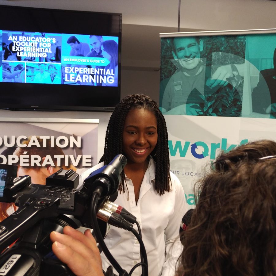 Highschool student interviewed at Experiential Learning Announcement