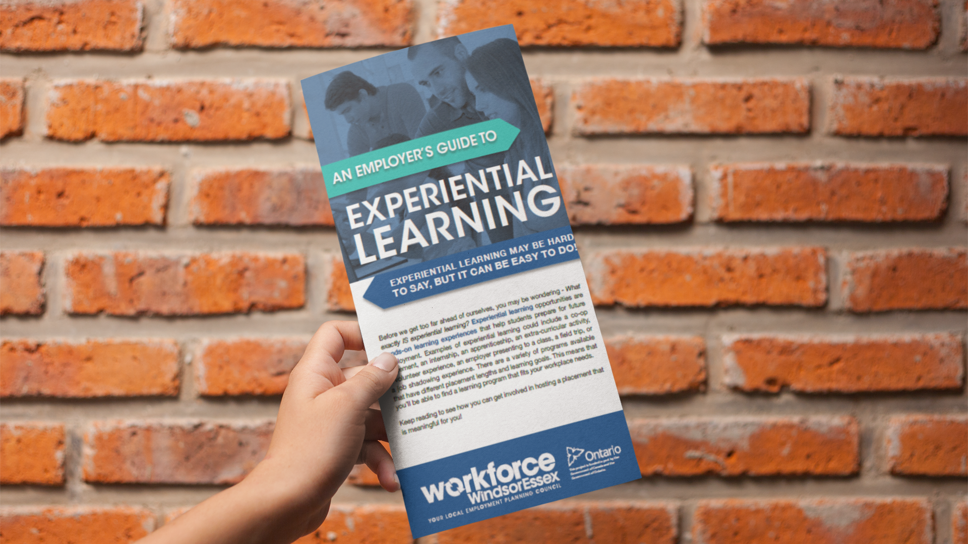 Person holding An Employer's Guide to Experiential Learning