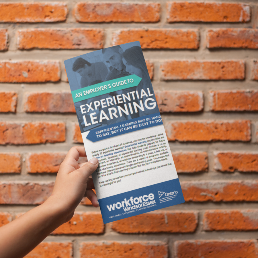 Person holding An Employer's Guide to Experiential Learning
