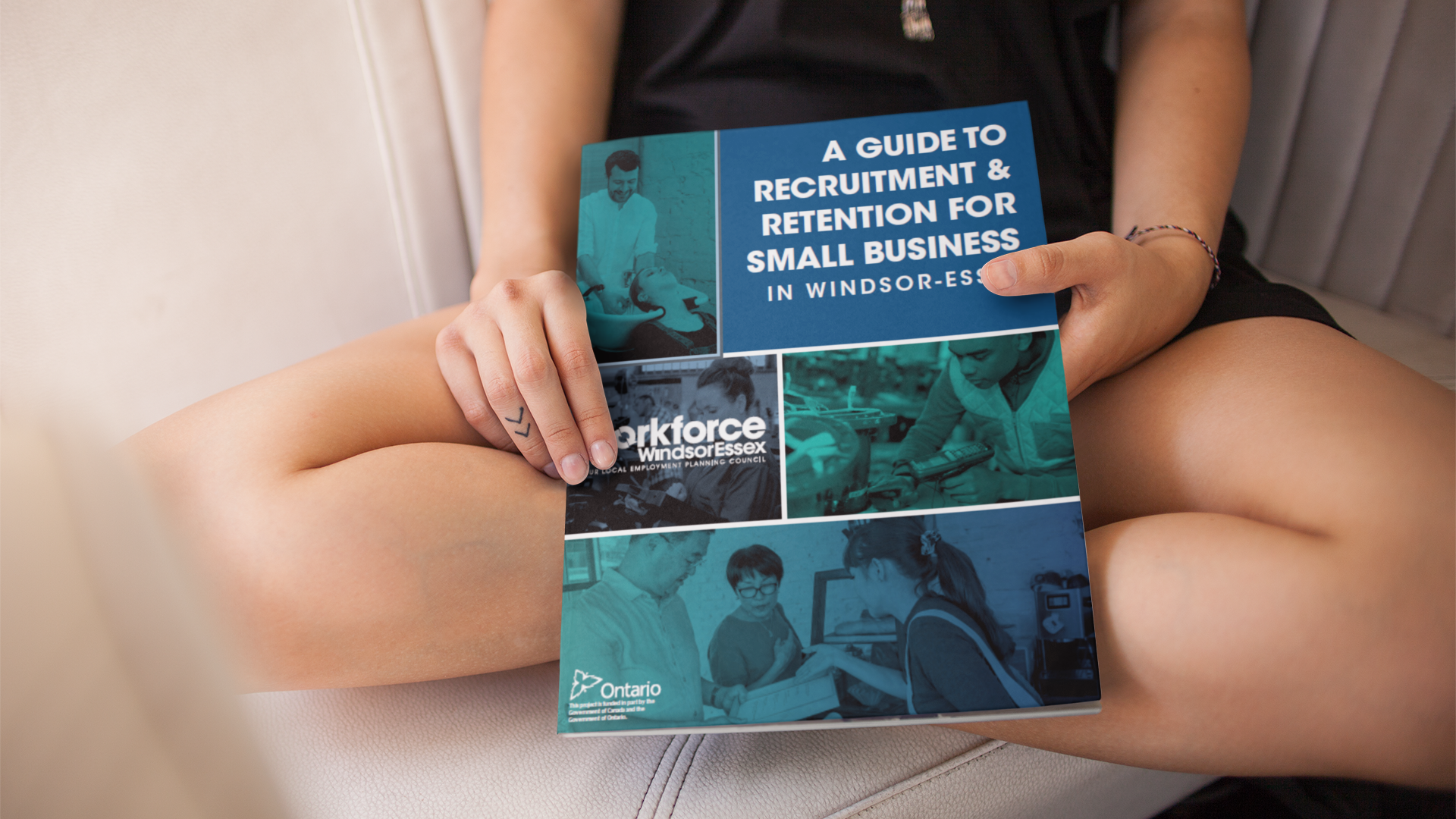 Person holding A Guide to Recruitment and Retention for Small Business in Windsor-Essex