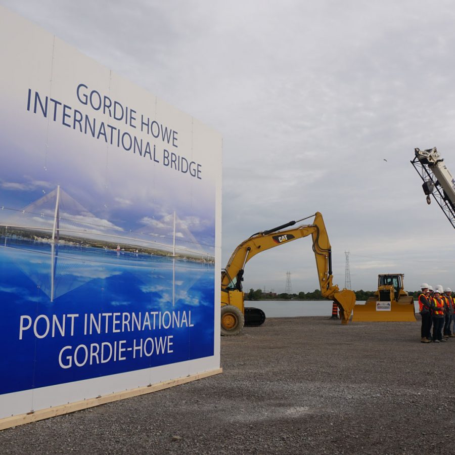 Gordie Howe International Bridge construction site with large sign