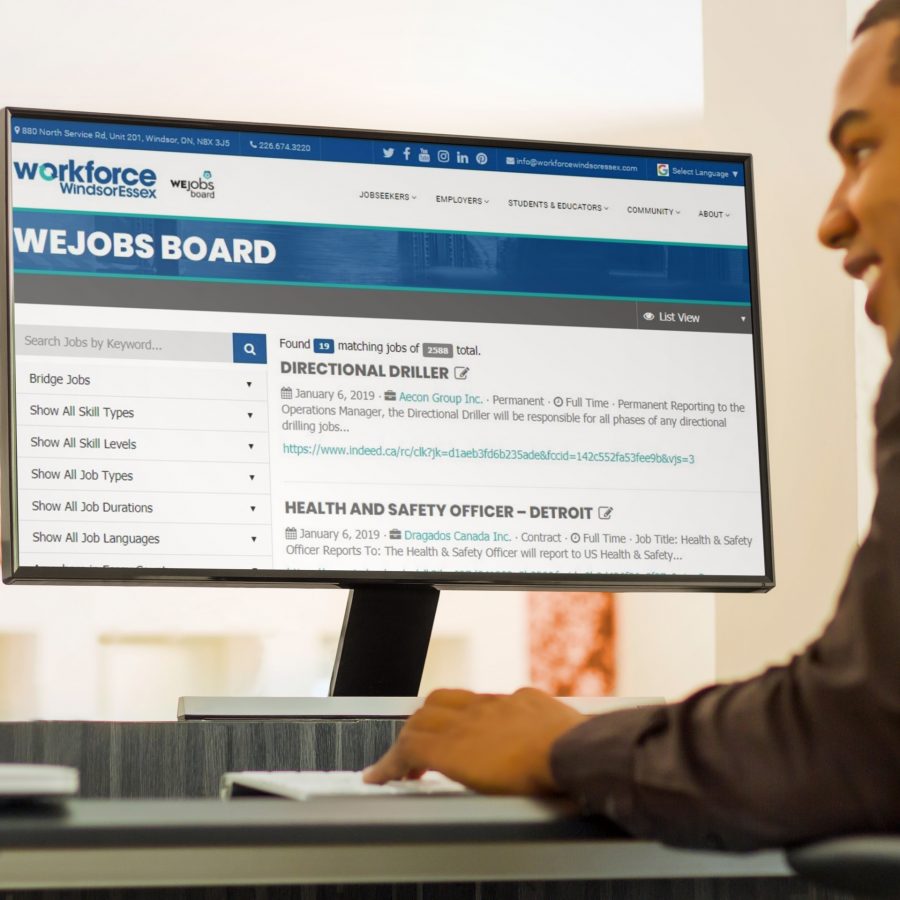 Person looking at WEjobs Board on desktop computer