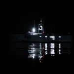 Presteve - boat on water at night