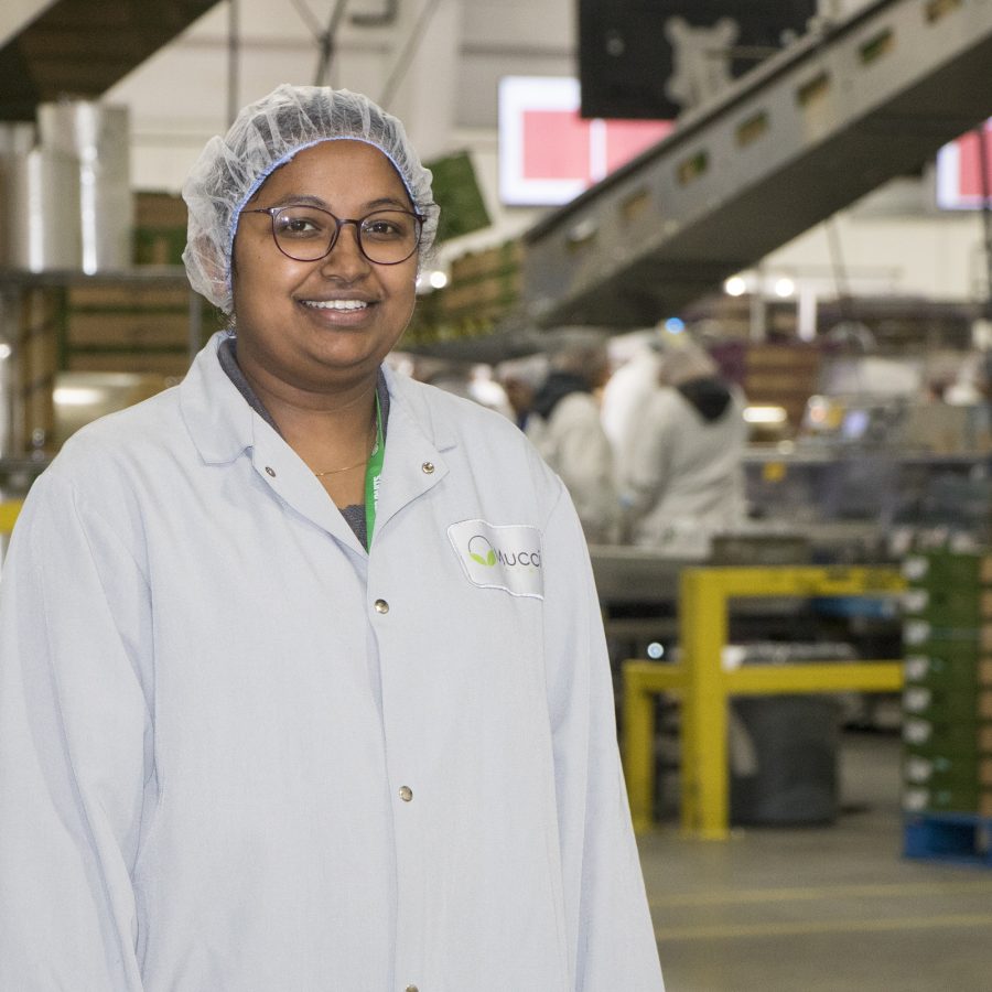 Woman working inside agriculture facility