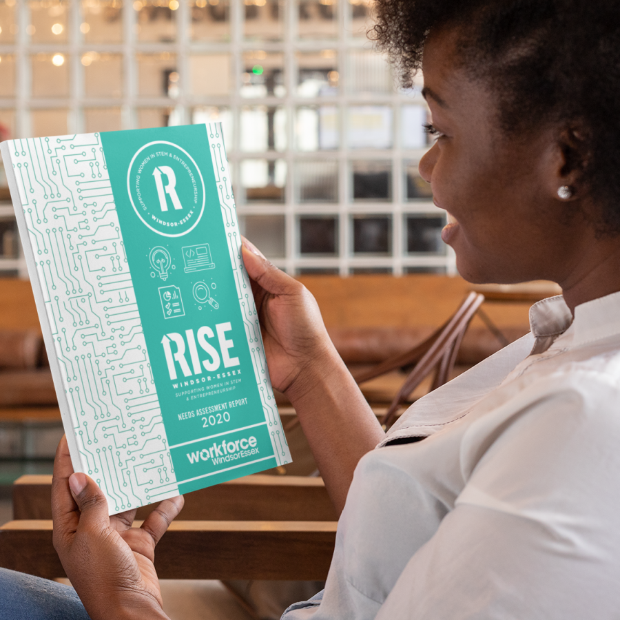 Woman reading RISE Windsor-Essex report