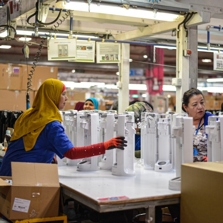 Woman working in manufacturing facility